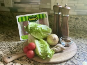 Main ingredients for gyro lettuce boats: Turkey, lettuce, onion, tomatoes, spices, ginger, salt and pepper