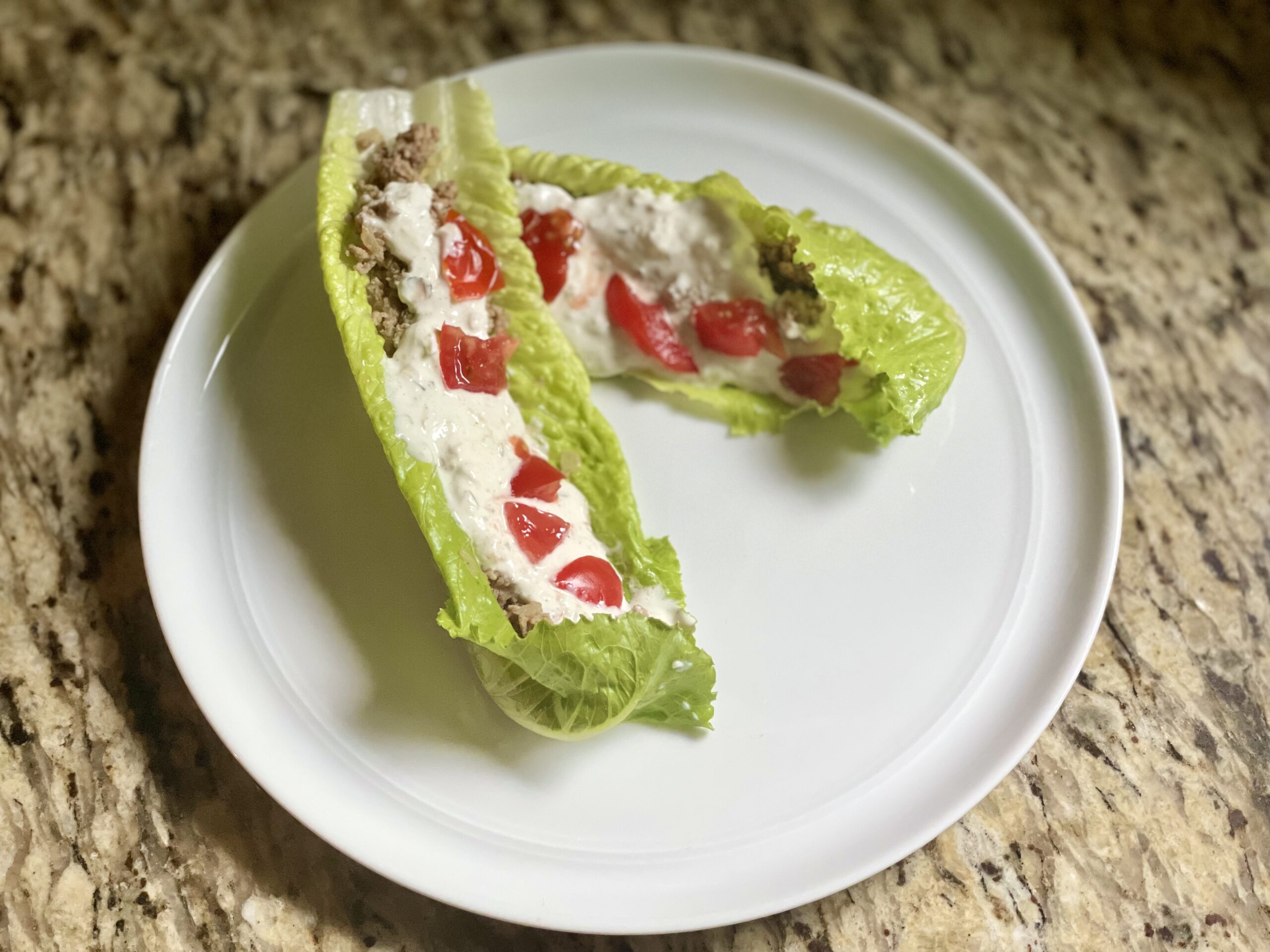 Two Gyro Lettuce Boats on a White Plate