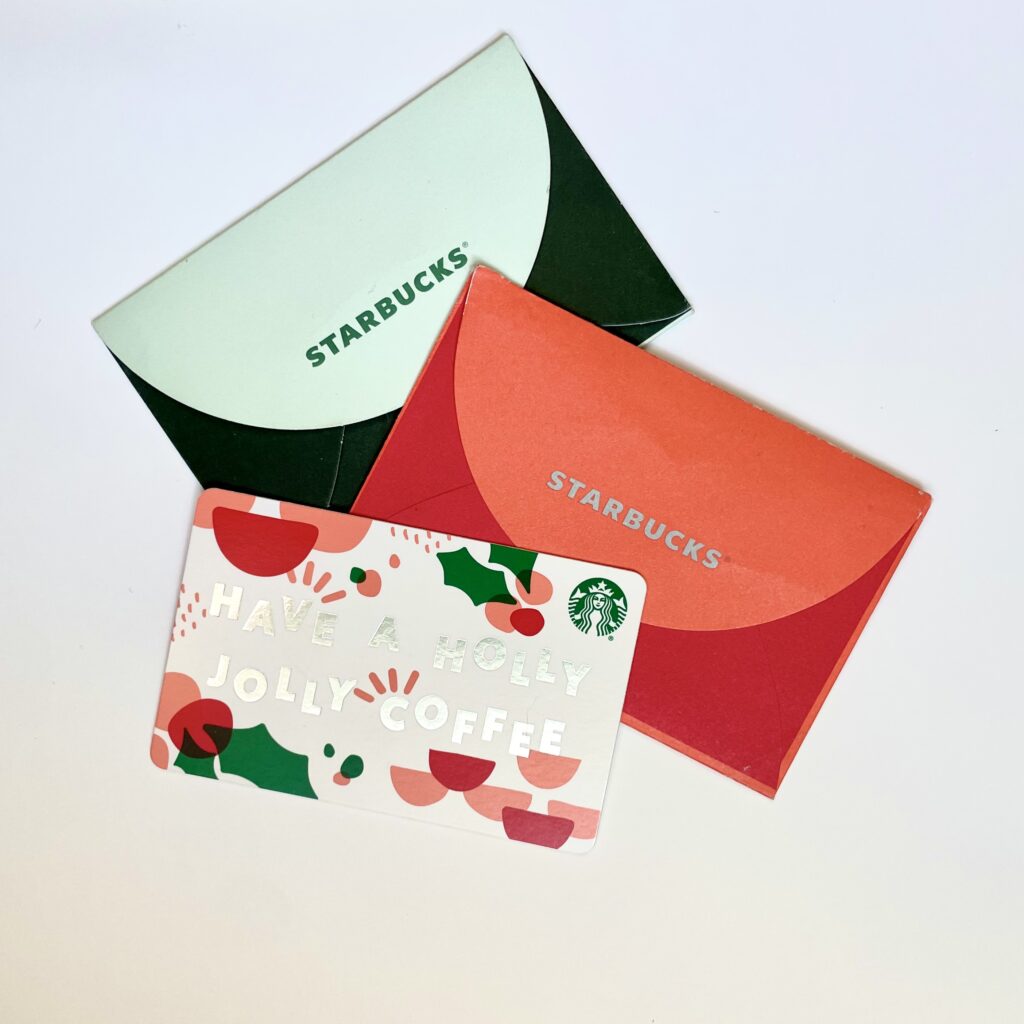 Three Starbucks gift cards.