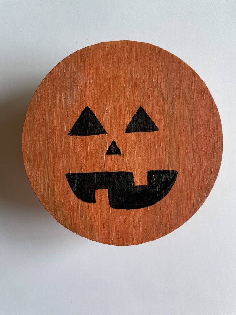 The final orange and black pumpkin coaster. 