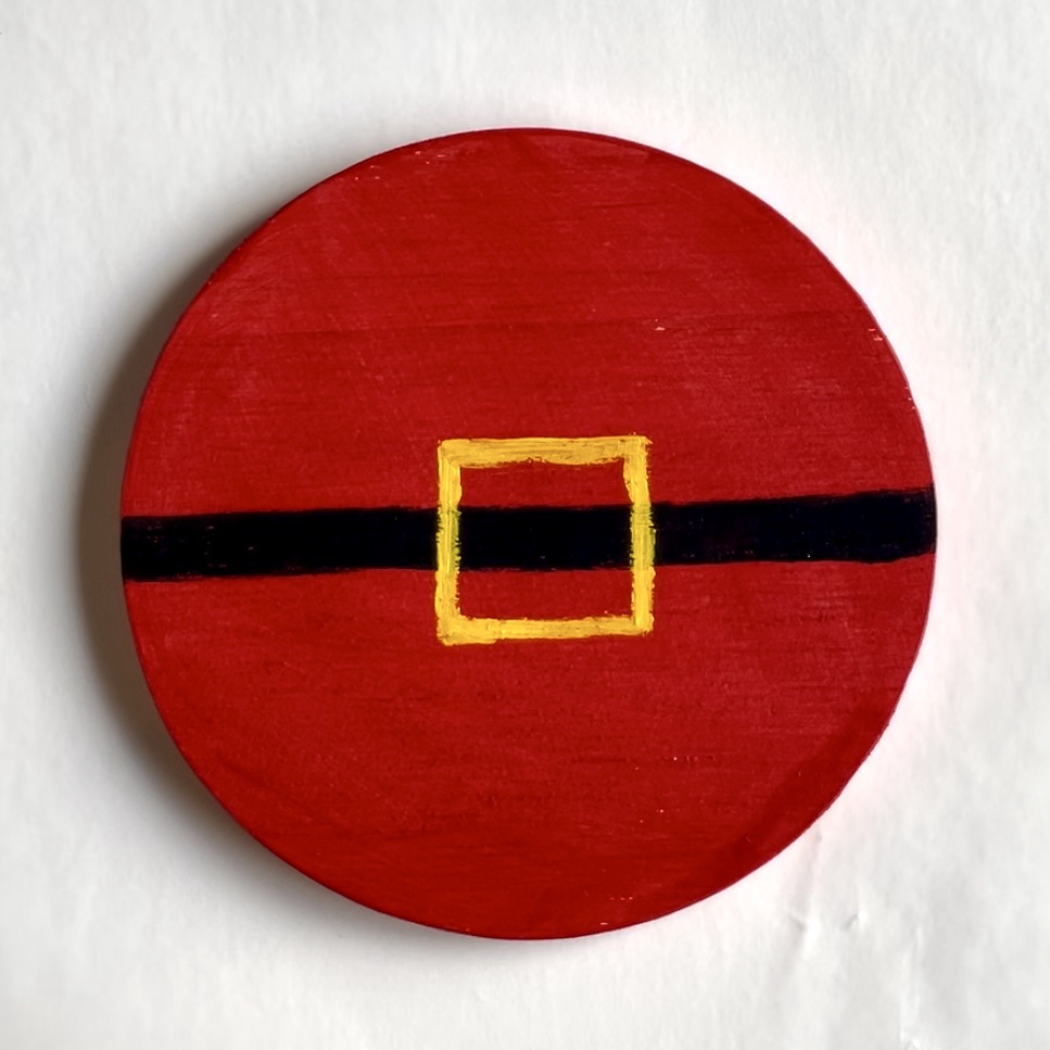 Red coaster, with a black line, and a yellow outlined square. 