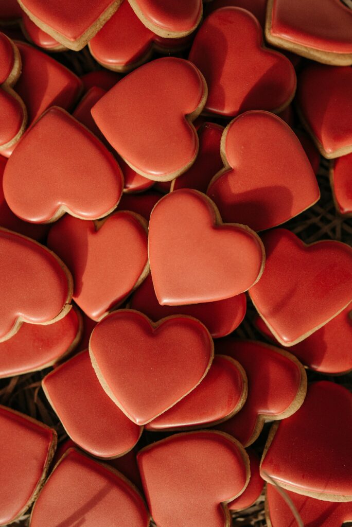 Heart sugar cookies, with red frosting. 
