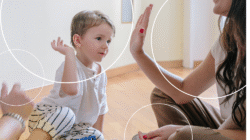 When the Summer To-Do List Stops Working: What Now? Blog cover photo of a young boy giving his mother a high five.
