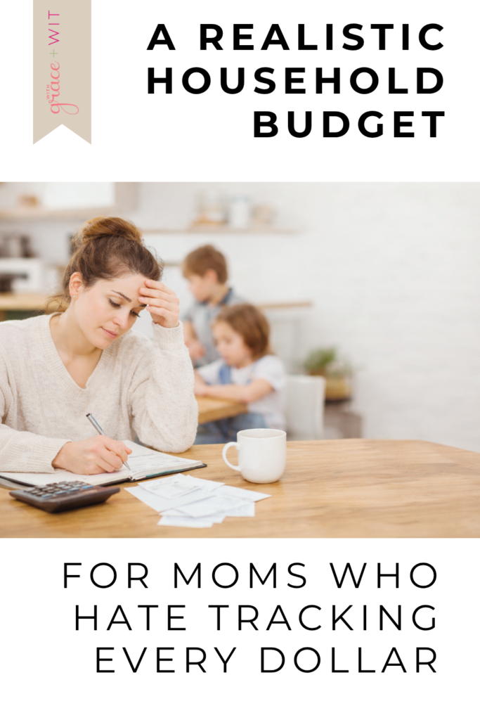 A woman using a realistic home budgeting system to make life easier. She is sitting at a table with a budget planner.