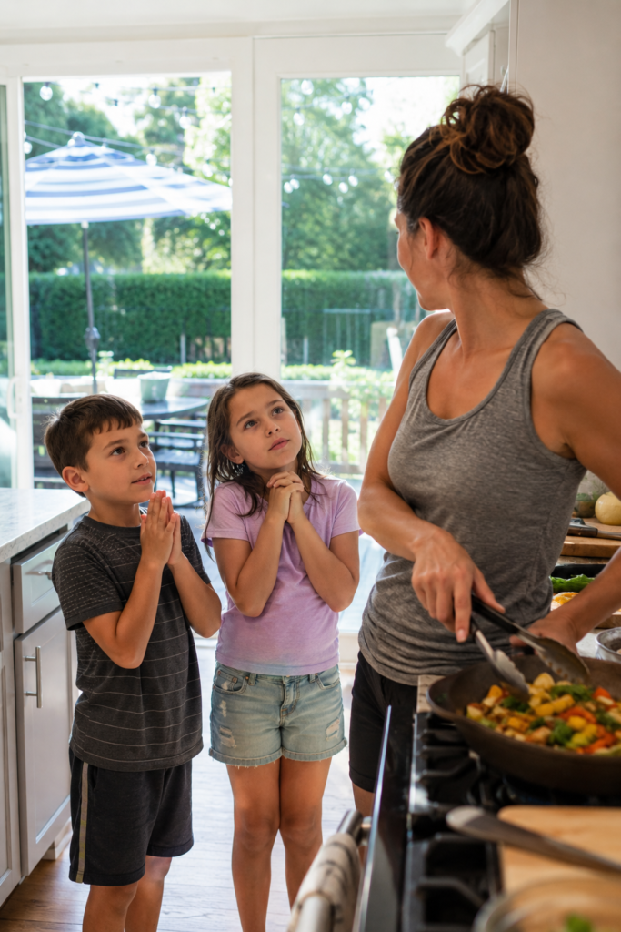 mom cooking dinner with kids asking questions in the background.