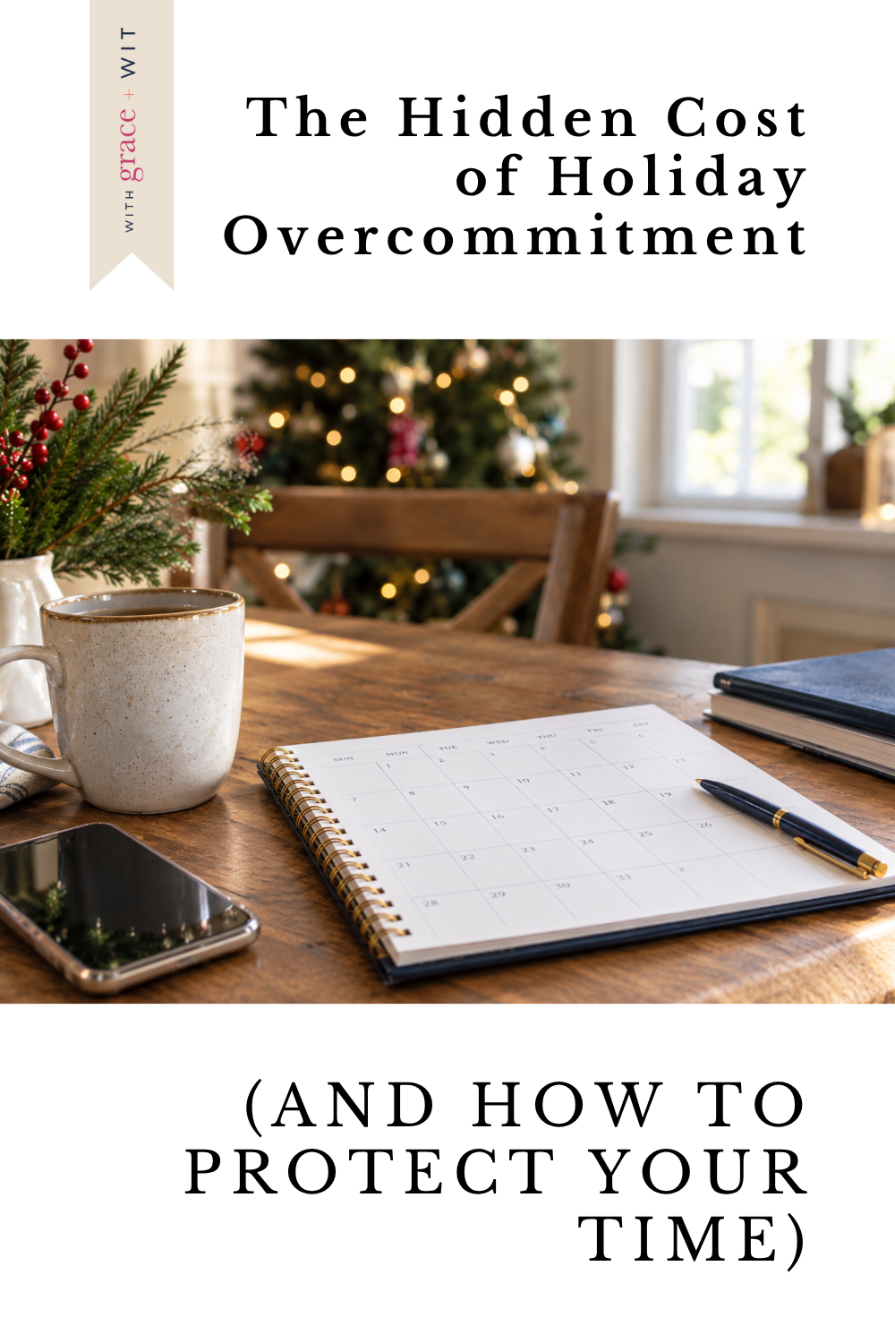 a calendar next to a table with Christmas decorations and a tree in the background